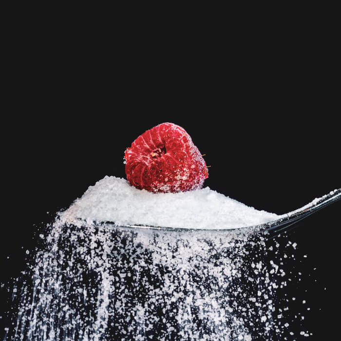 Raspberry on a spoonful of sugar