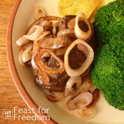 Beef liver and onions with pan fried potatoes and broccoli
