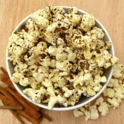 Popcorn in a bowl with a cinnamon topping