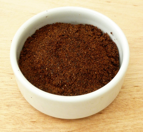 Homemade date sugar in a small bowl